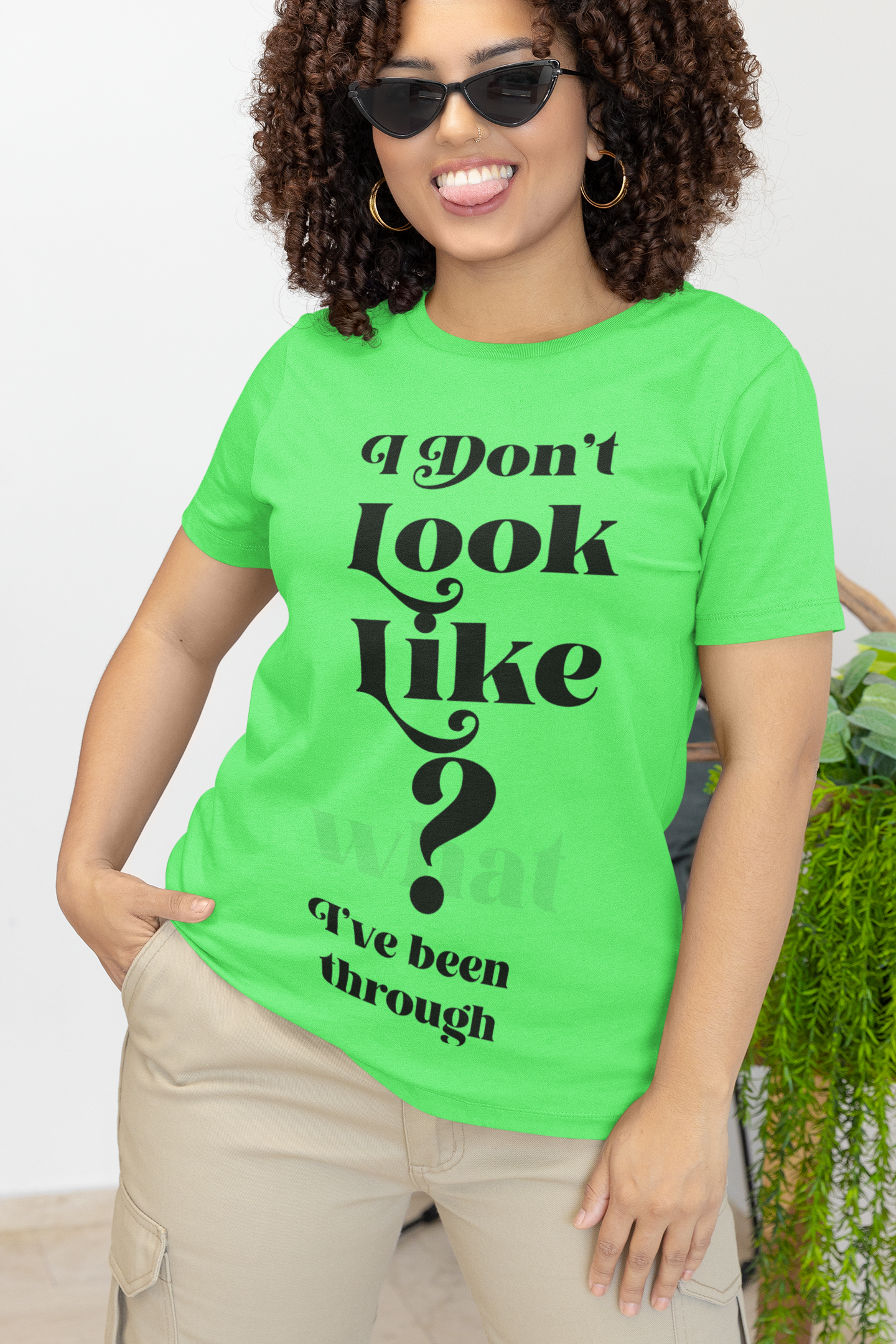 I DONT LOOK LIKE WHAT I BEEN THROUGH (UNISEX T-SHIRT)