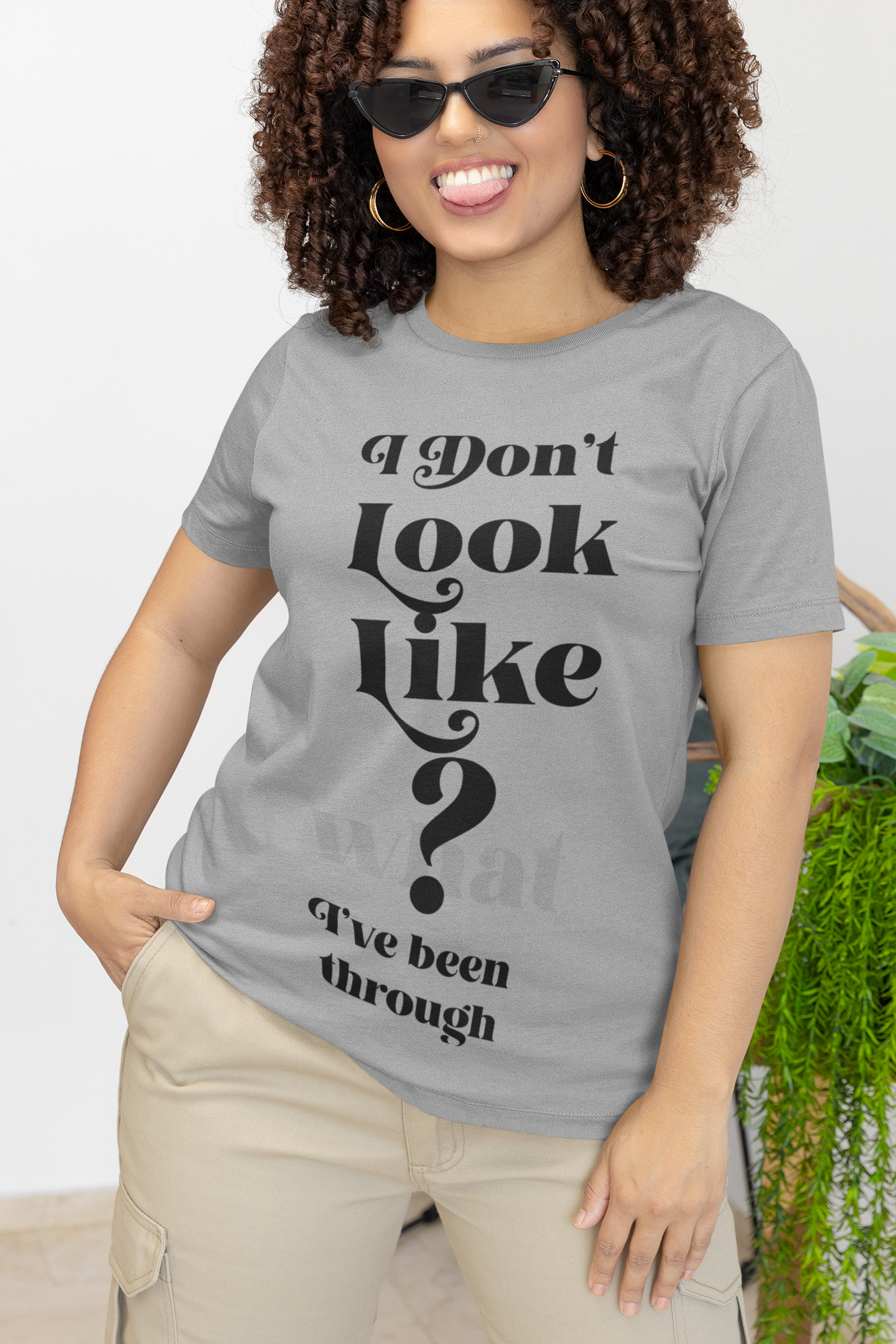 I DONT LOOK LIKE WHAT I BEEN THROUGH (UNISEX T-SHIRT)