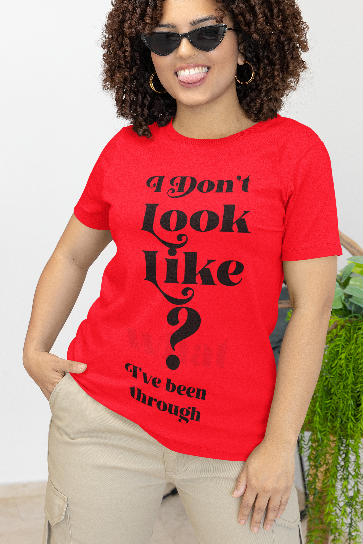 I DONT LOOK LIKE WHAT I BEEN THROUGH (UNISEX T-SHIRT)